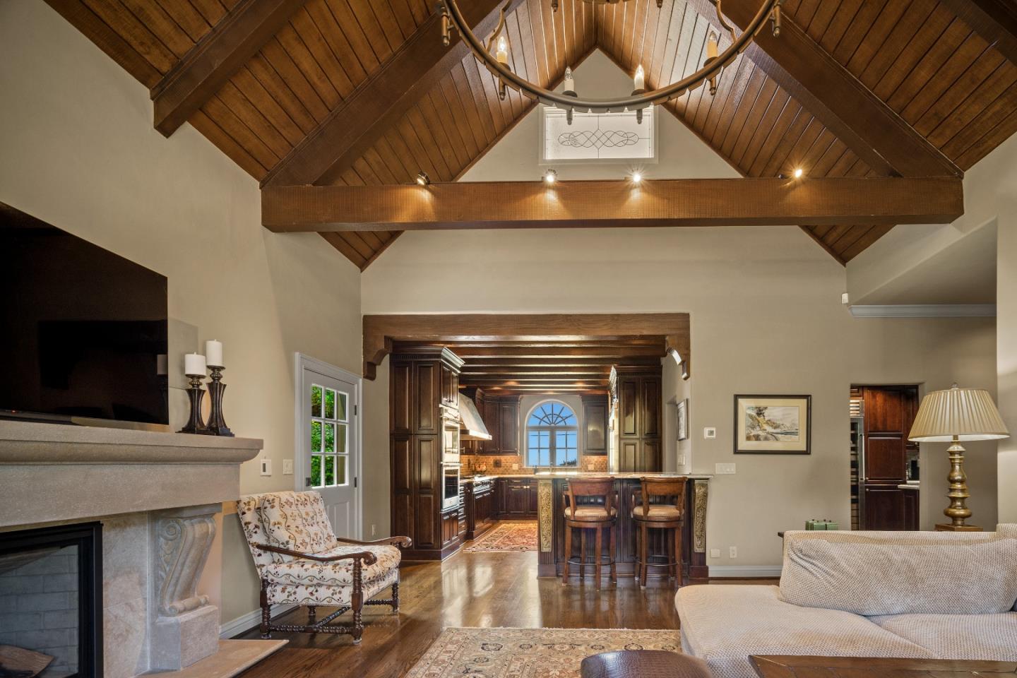 3017 Cormorant Road Pebble Beach, CA 93953 - Photo 5 of 42 a living room with furniture and a flat screen tv