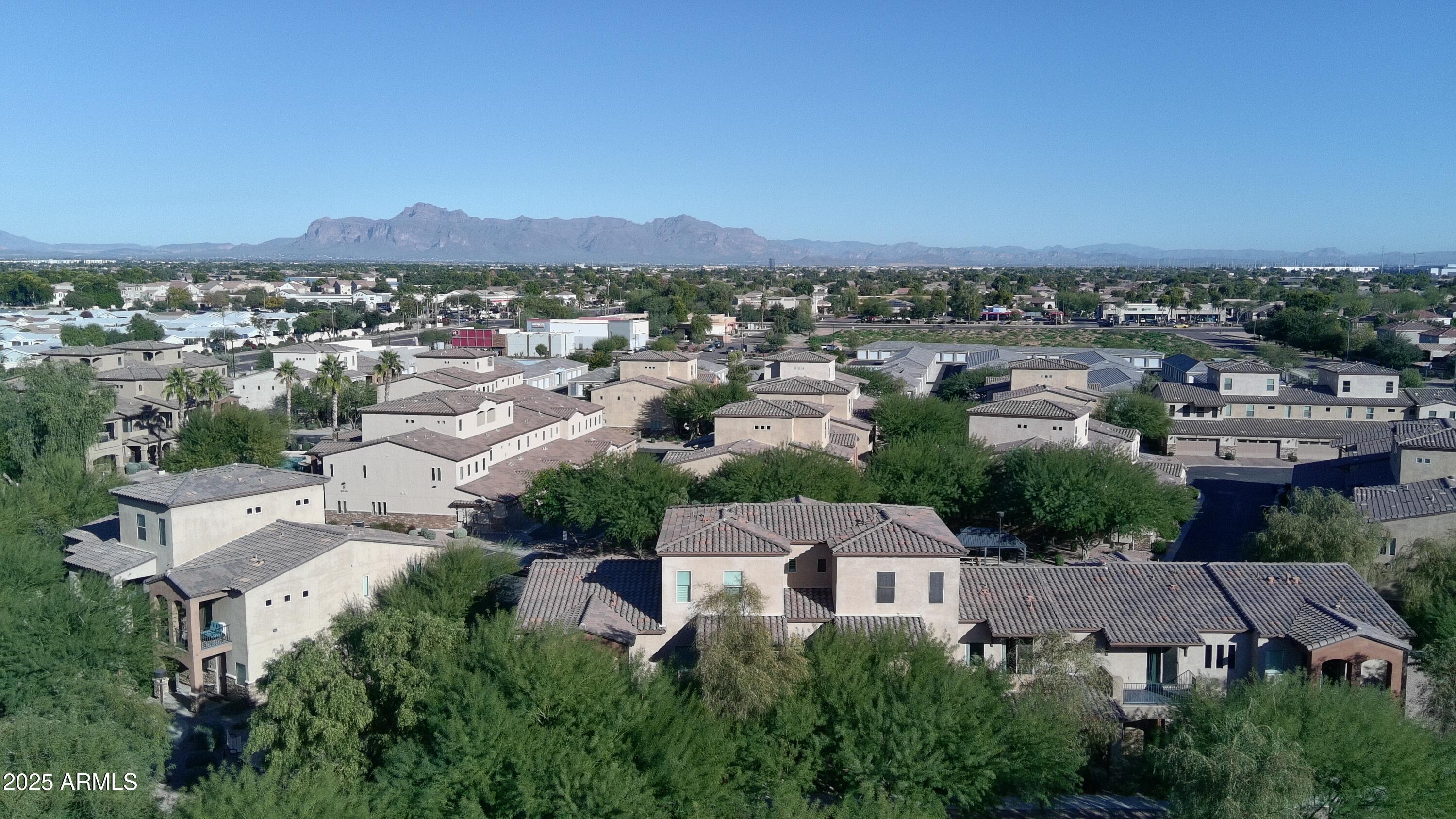 2821 South Skyline Drive, Unit 141 Mesa, AZ 85212 - Photo 53 of 68 an aerial view of residential houses with outdoor space