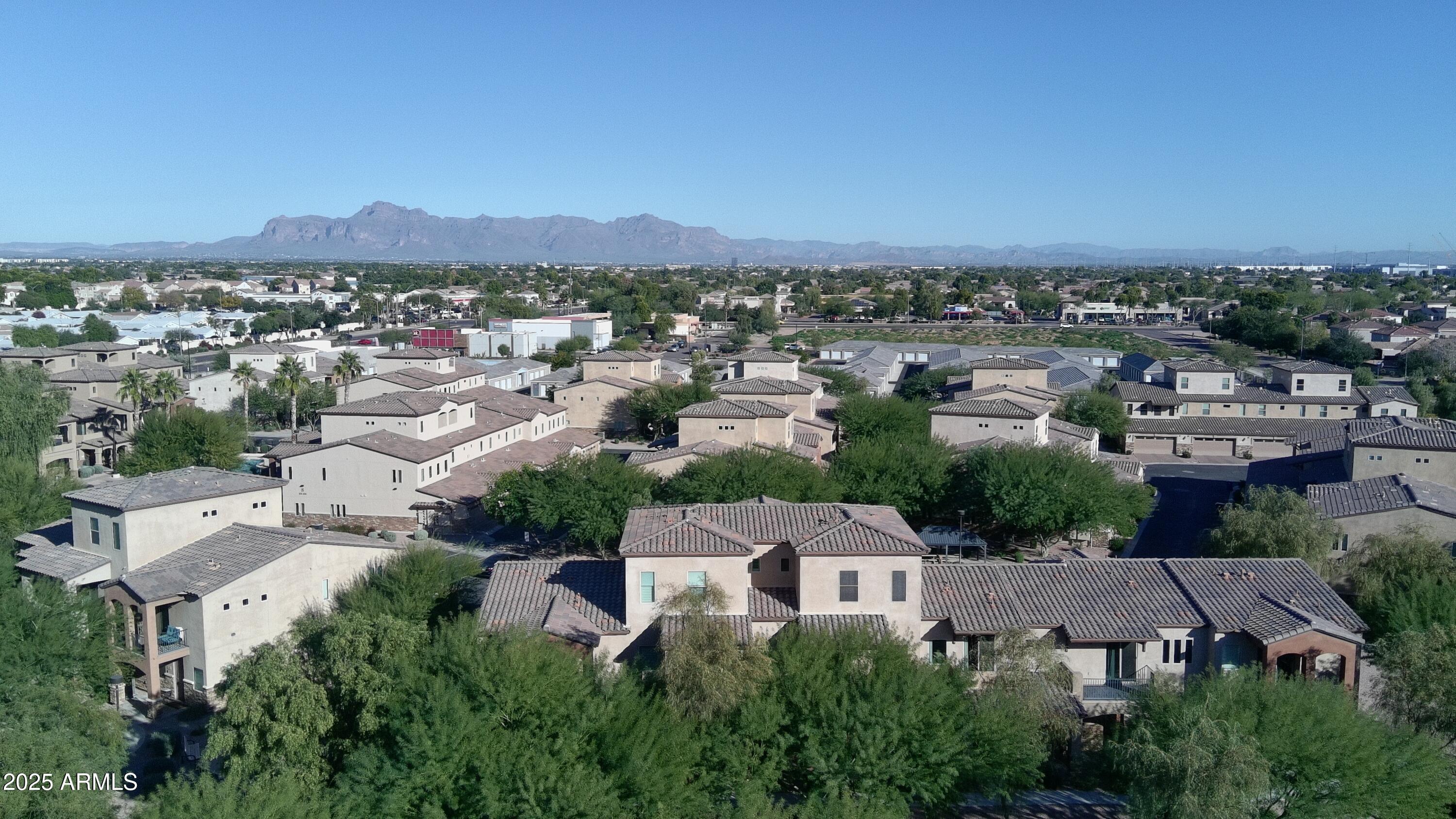 2821 South Skyline Drive, Unit 141 Mesa, AZ 85212 - Photo 58 of 68 an aerial view of residential houses with outdoor space
