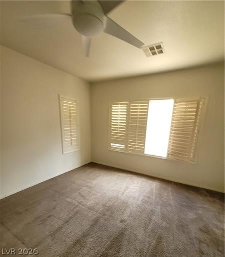 677 Principle Point Avenue Henderson, NV 89012 - Photo 13 of 40 Spare room featuring carpet floors and ceiling fan