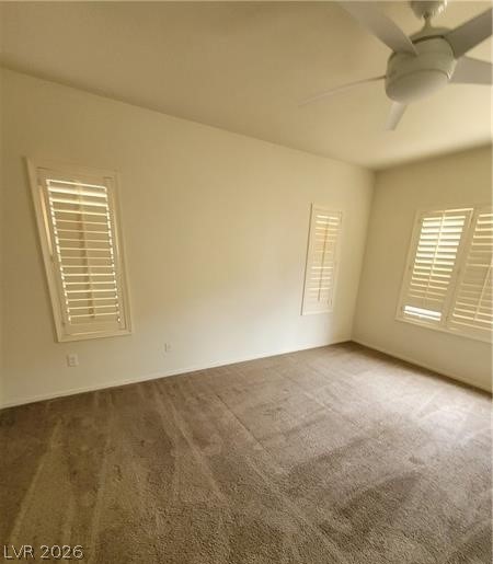 677 Principle Point Avenue Henderson, NV 89012 - Photo 16 of 40 Unfurnished room featuring ceiling fan and carpet