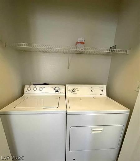 677 Principle Point Avenue Henderson, NV 89012 - Photo 22 of 40 Laundry area with separate washer and dryer