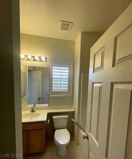 677 Principle Point Avenue Henderson, NV 89012 - Photo 24 of 40 Bathroom with vanity and tile patterned floors