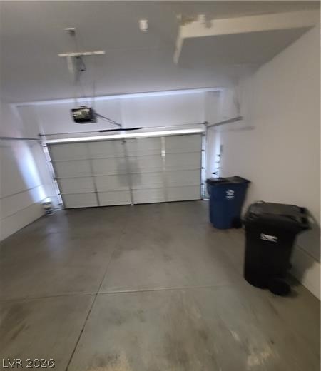 677 Principle Point Avenue Henderson, NV 89012 - Photo 30 of 40 Garage featuring a garage door opener
