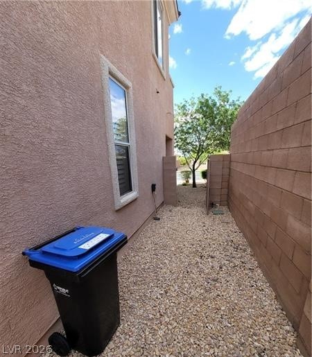 677 Principle Point Avenue Henderson, NV 89012 - Photo 31 of 40 View of side of property featuring stucco siding