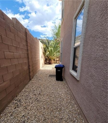 677 Principle Point Avenue Henderson, NV 89012 - Photo 36 of 40 View of home's exterior with stucco siding