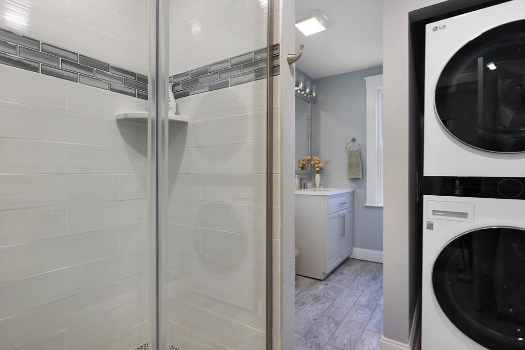 15 Whitman Road Medford, MA 02155 - Photo 13 of 39 a bathroom with a sink and a mirror