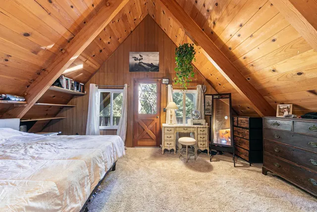 a view of a backyard with furniture