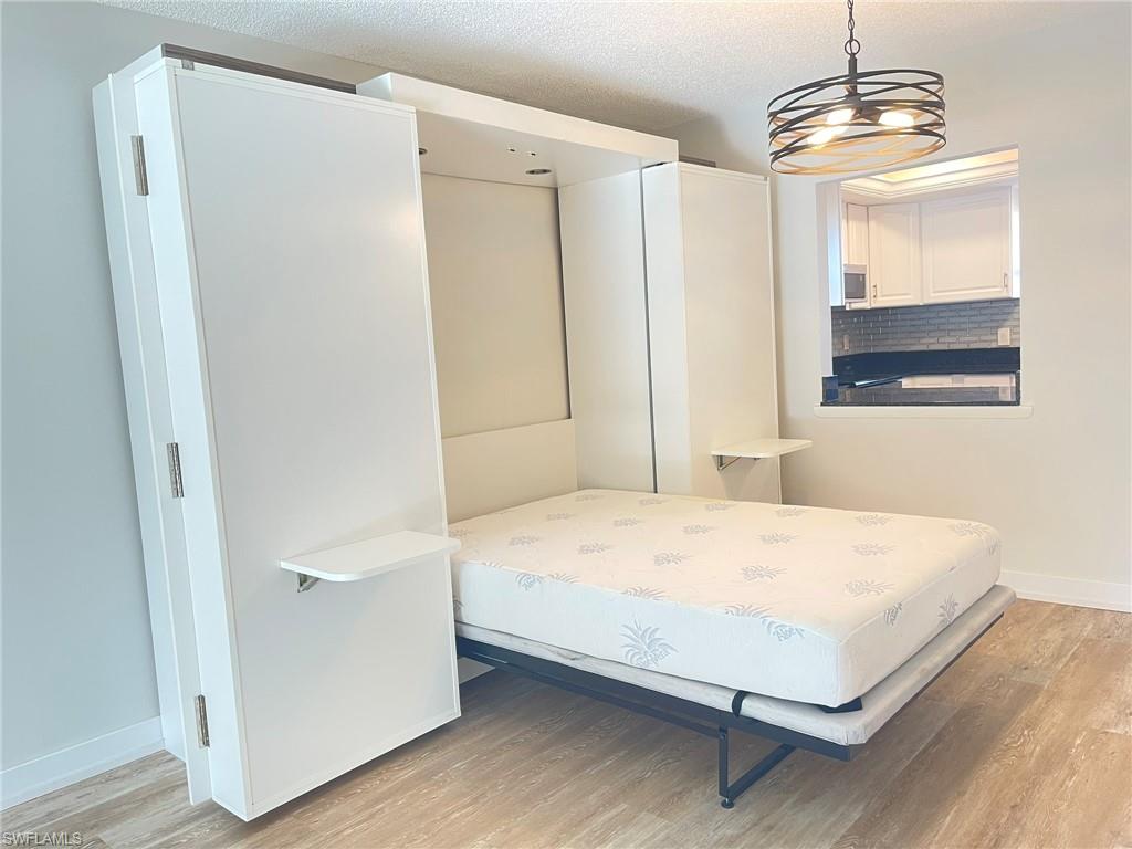 5499 Rattlesnake Hamm Road, Unit 2 Naples, FL 34113 - Photo 27 of 34 Murphy bed