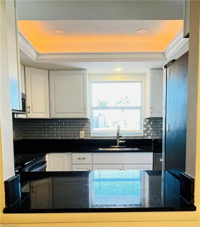 5499 Rattlesnake Hamm Road, Unit 2 Naples, FL 34113 - Photo 6 of 23 View of kitchen from dining area