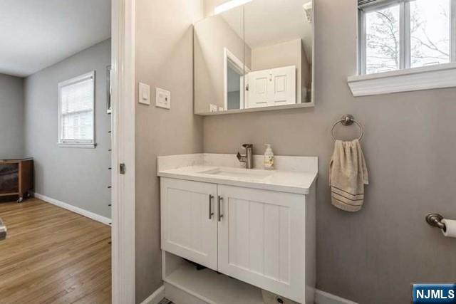 23 Asmus Road Closter, NJ 07624 - Photo 17 of 38 a bathroom with a sink and a window