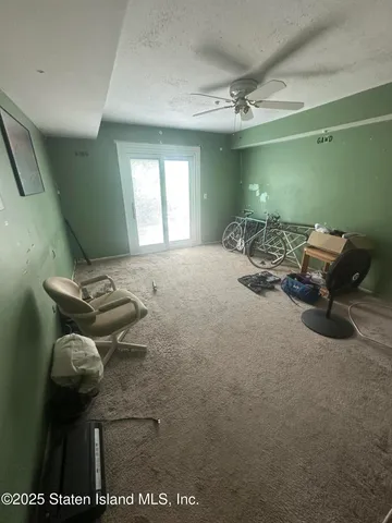 a bed room with furniture and a window