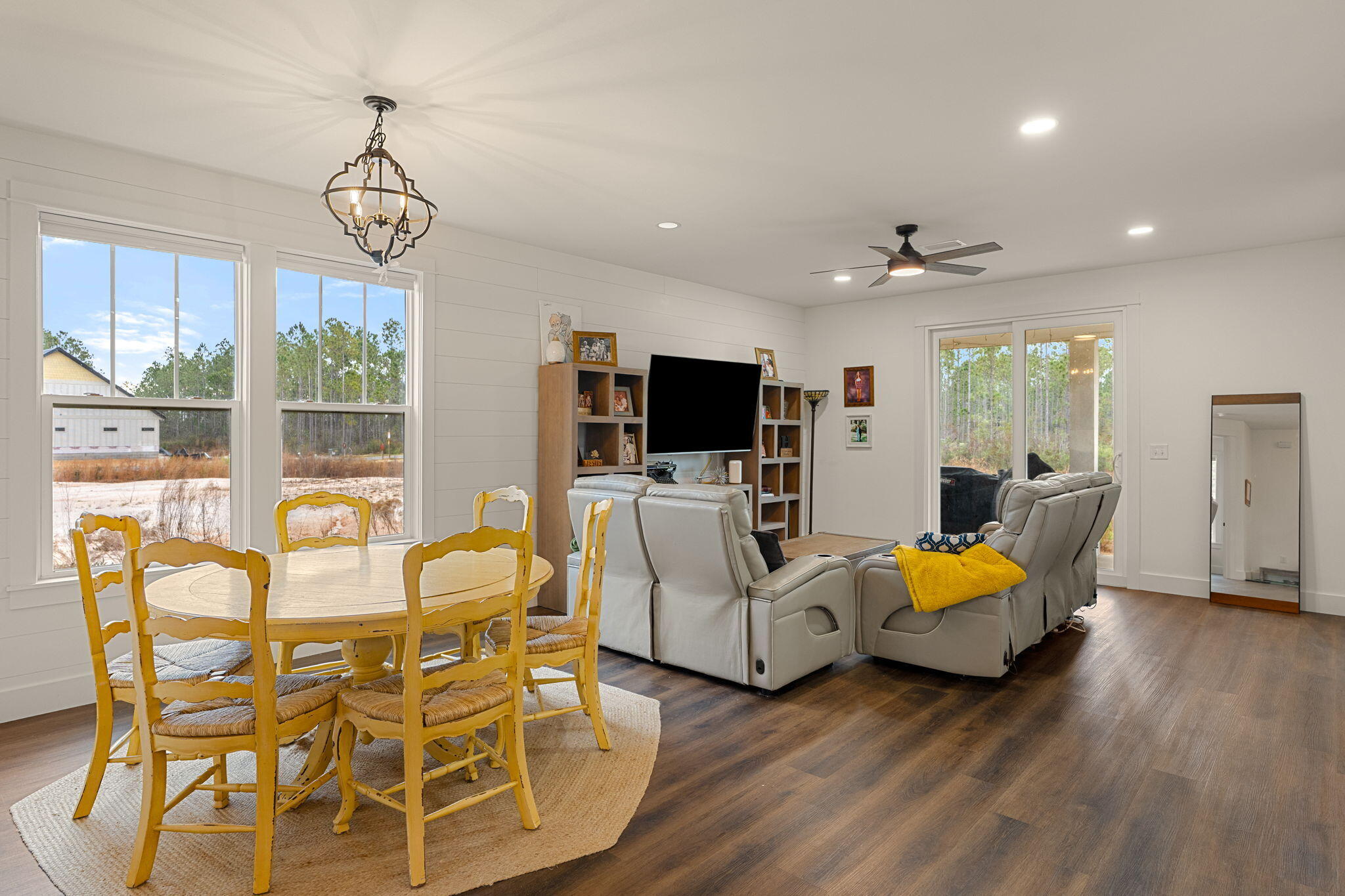 135 Clarke Hl Road Freeport, FL 32439 - Photo 8 of 41 a view of a livingroom with furniture wooden floor and windows