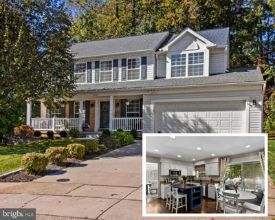 a front view of a building with lots of trees and plants