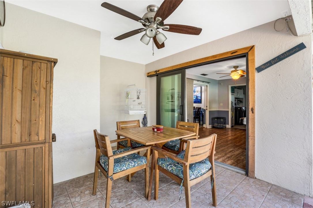 701 East 14th Street Lehigh Acres, FL 33972 - Photo 17 of 31 a dining room with furniture and window