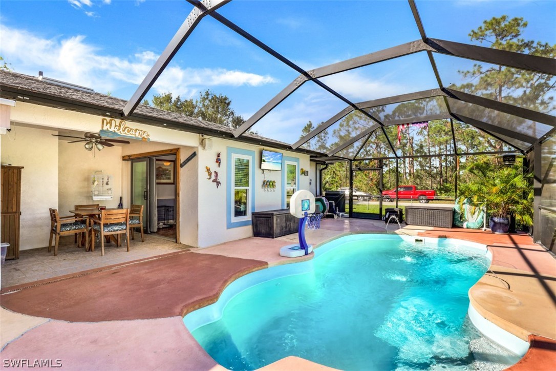 701 East 14th Street Lehigh Acres, FL 33972 - Photo 22 of 31 a view of a backyard