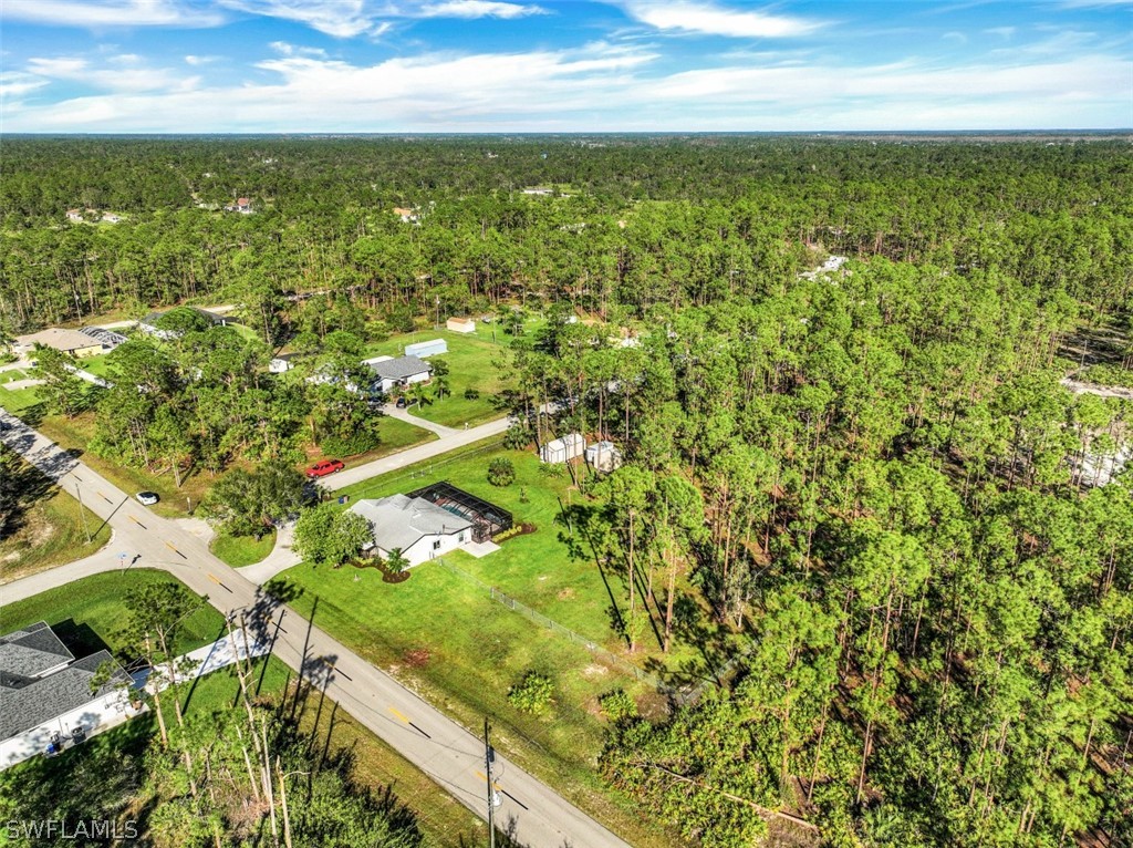 701 East 14th Street Lehigh Acres, FL 33972 - Photo 28 of 31 a view of yard with ocean view