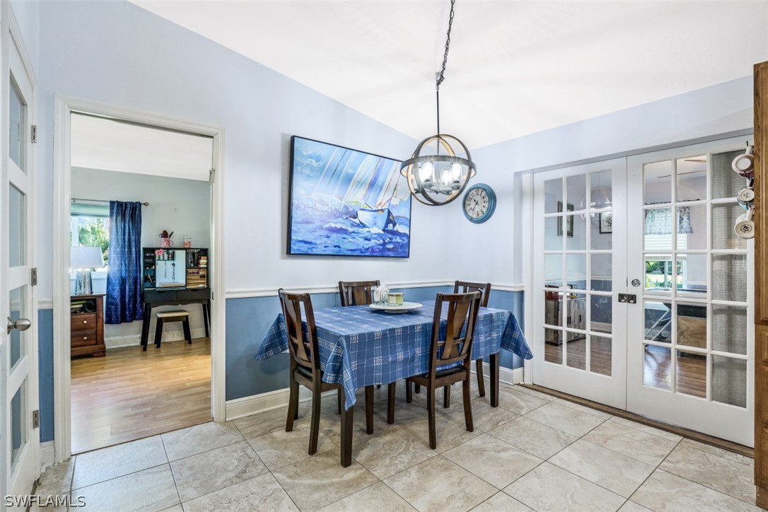 701 East 14th Street Lehigh Acres, FL 33972 - Photo 9 of 31 a view of a dining room with furniture