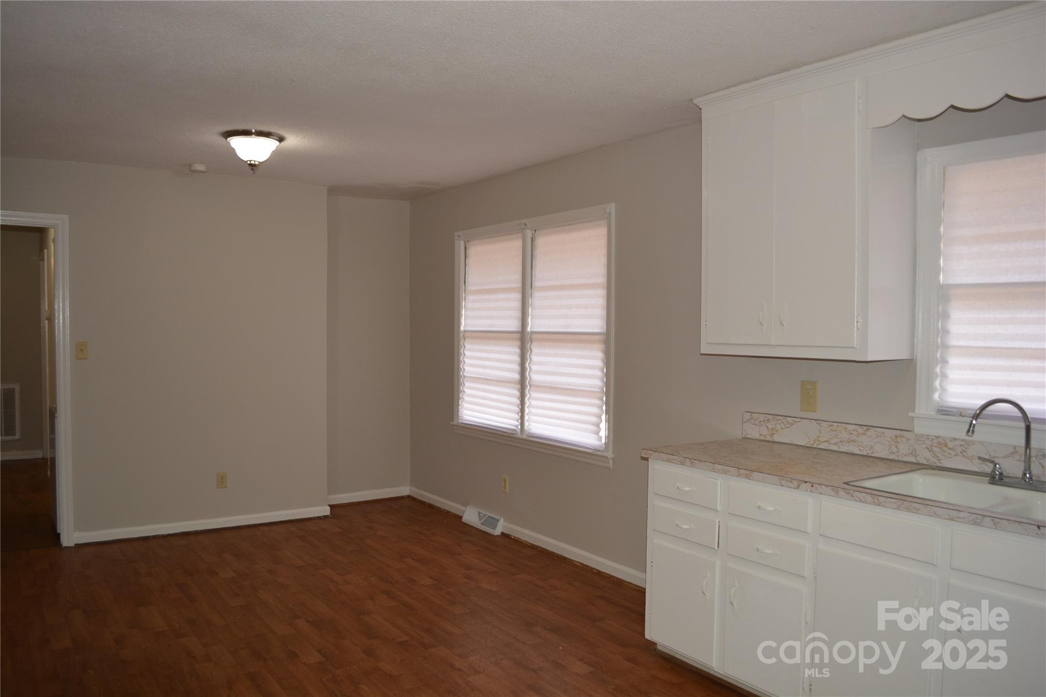 1206 Borders Road Shelby, NC 28150 - Photo 9 of 25 a room with a sink cabinets and a window
