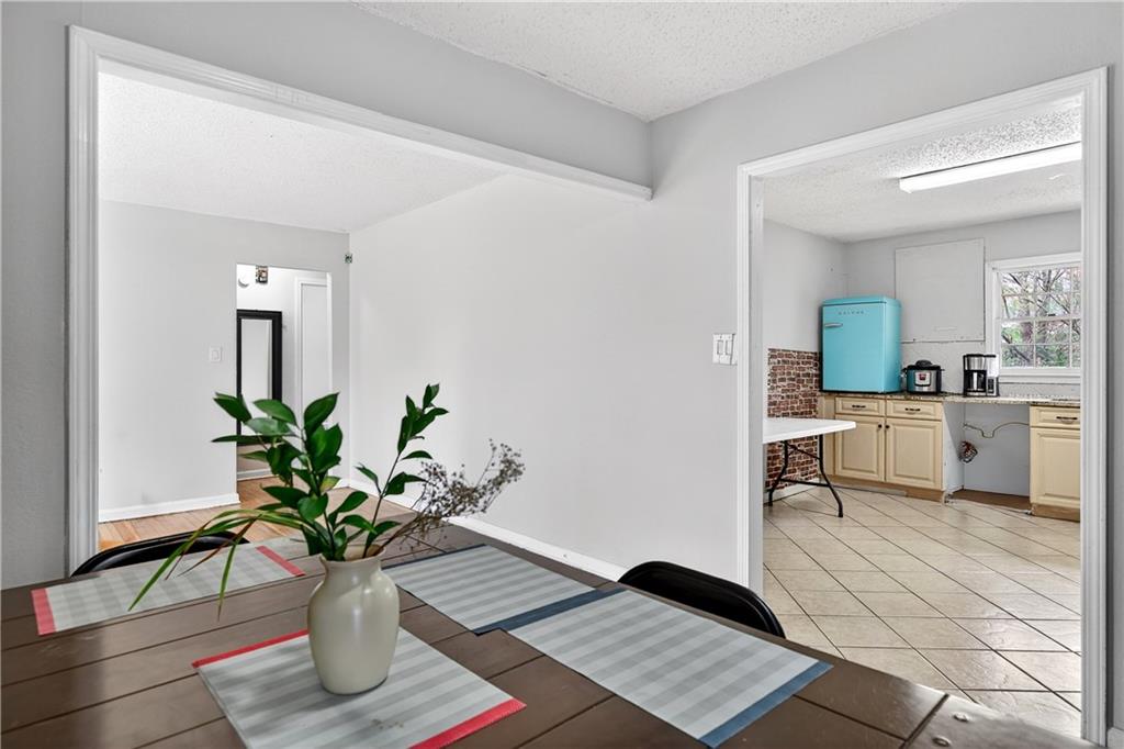 1742 Cardinal Road Hampton, GA 30228 - Photo 9 of 25 a living room with furniture and a potted plant