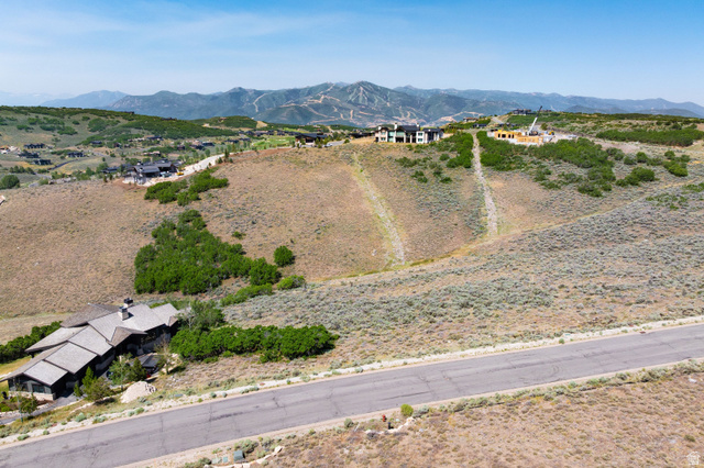 3508 Ridgeway Drive, Unit 31 Heber City, UT 84036 - Photo 2 of 13 Expansive mountain landscape featuring a paved road