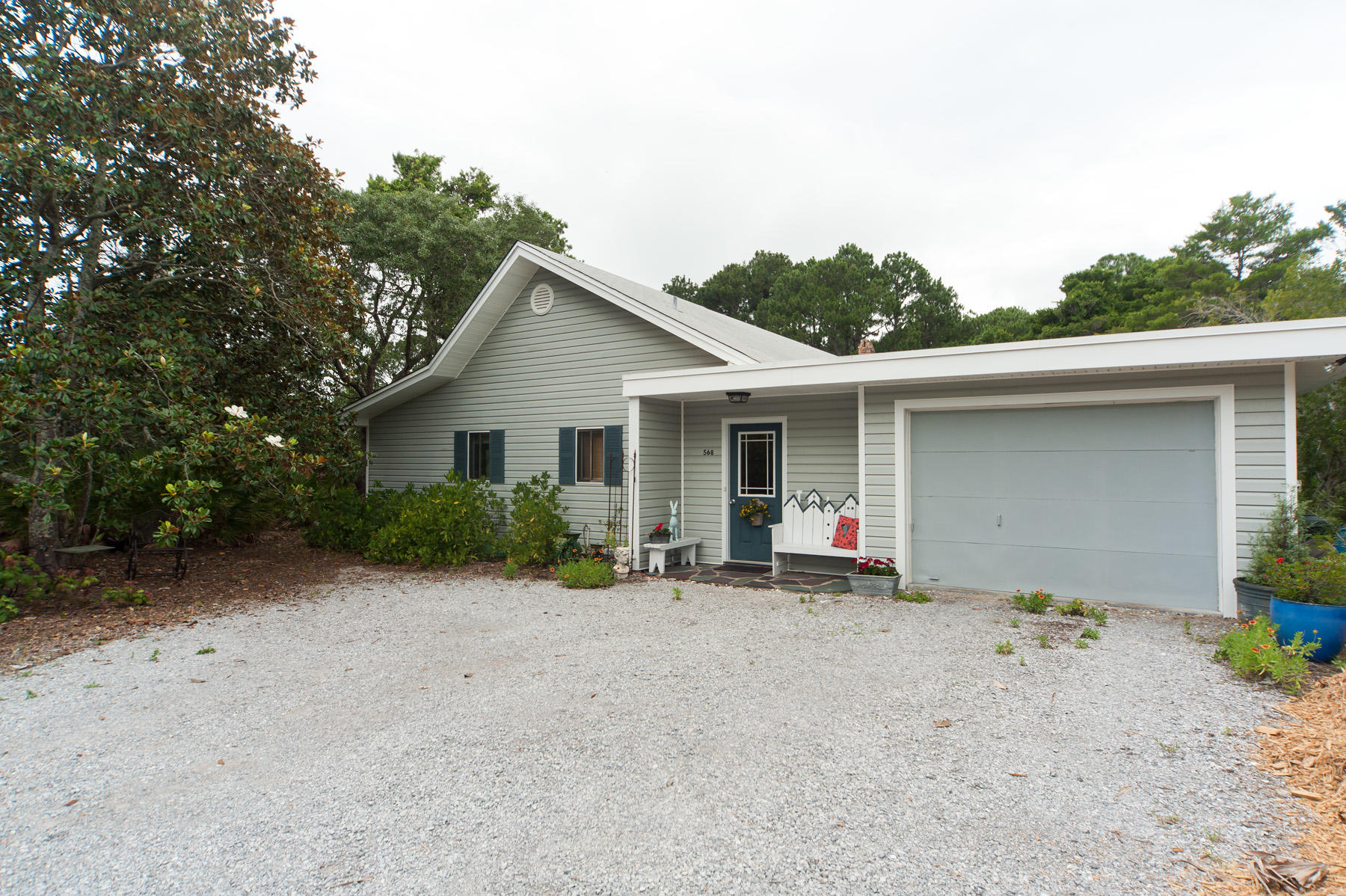 568 Ridge Road Santa Rosa Beach, FL 32459 - Photo 12 of 31 a view of a house with a patio