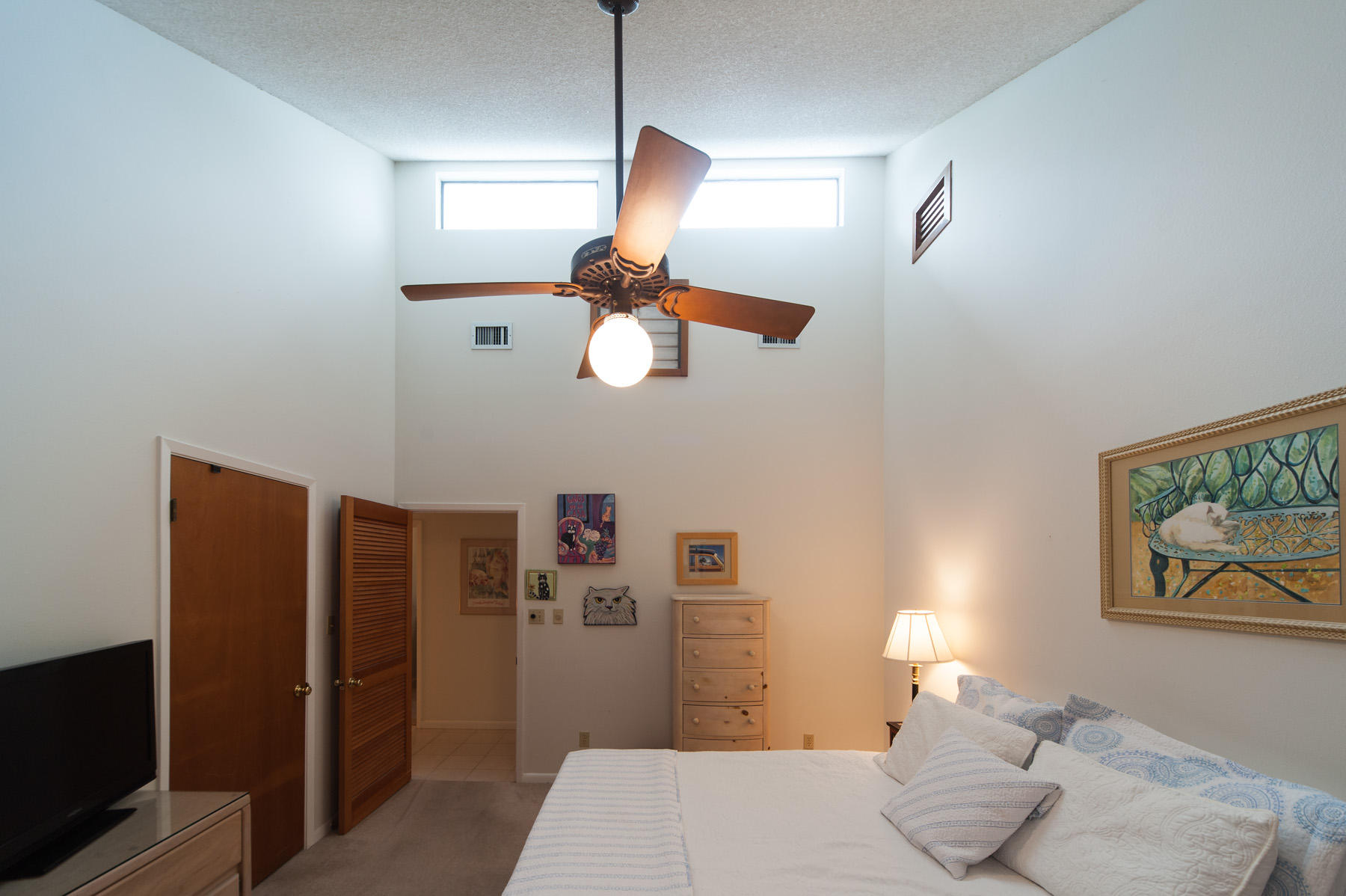 568 Ridge Road Santa Rosa Beach, FL 32459 - Photo 15 of 31 a bedroom with a bed and a flat screen tv