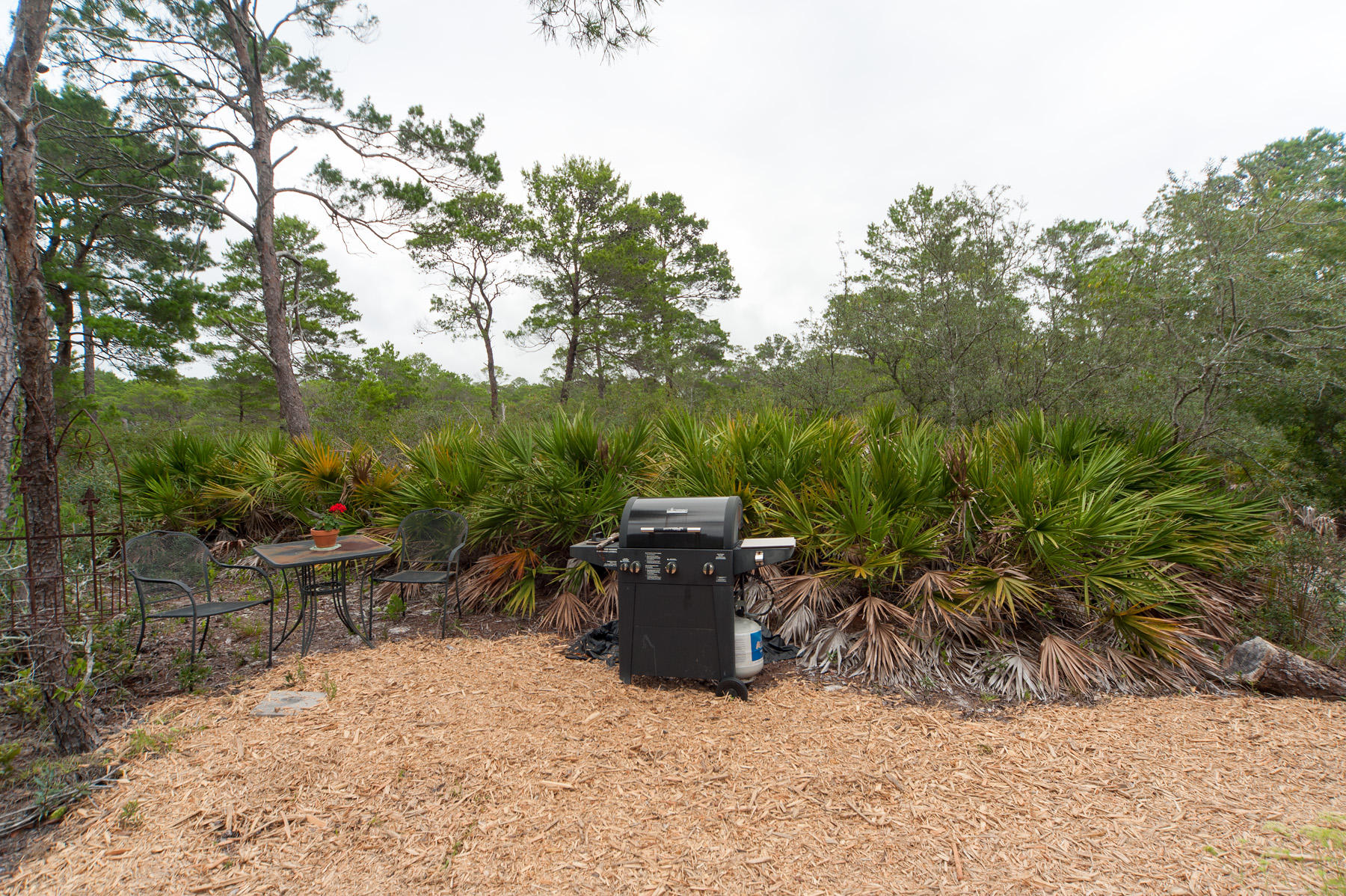568 Ridge Road Santa Rosa Beach, FL 32459 - Photo 24 of 31 a view of a chair and table in the outdoor space