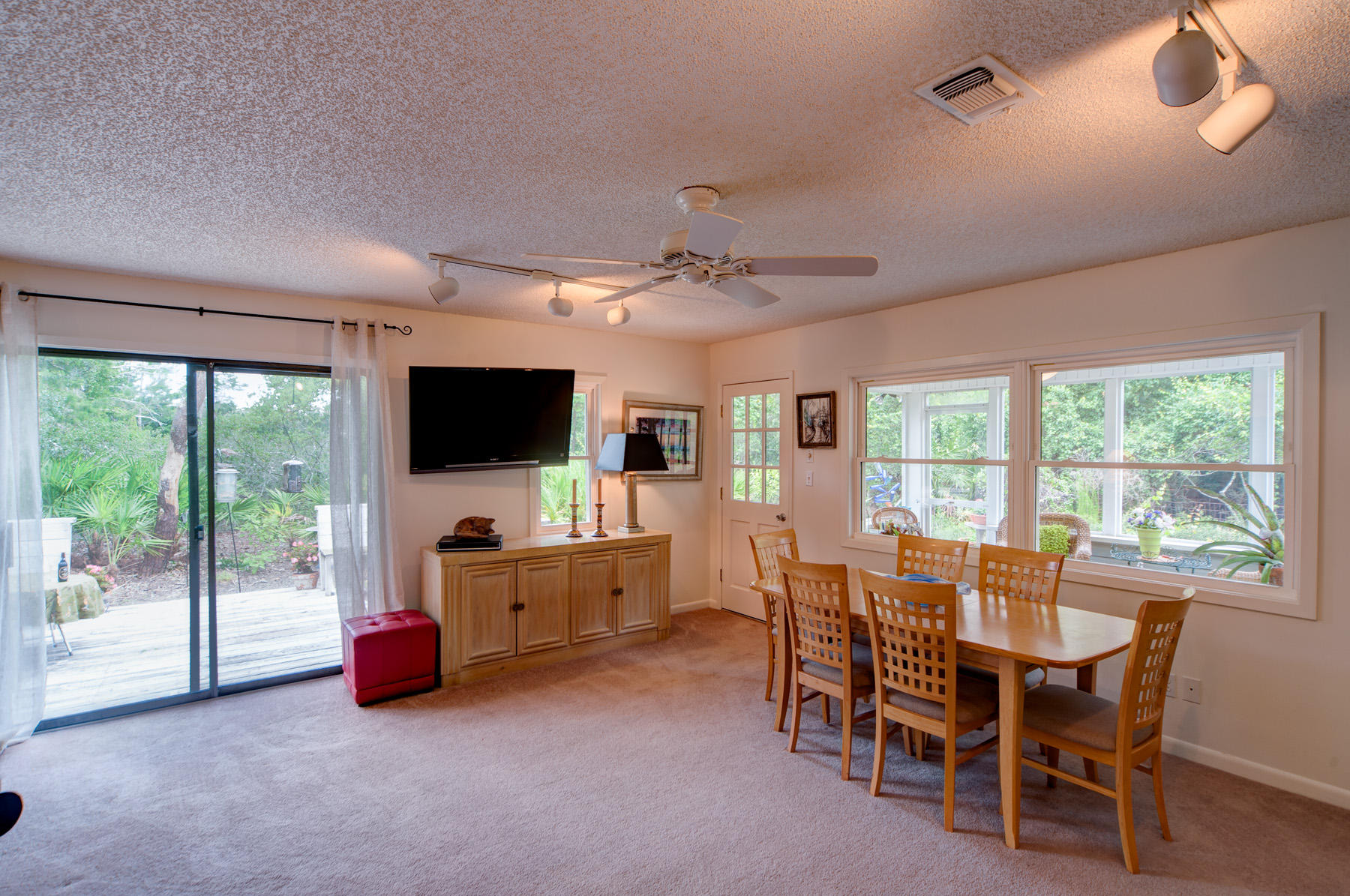 568 Ridge Road Santa Rosa Beach, FL 32459 - Photo 27 of 31 a view of a dining room with furniture window and outside view