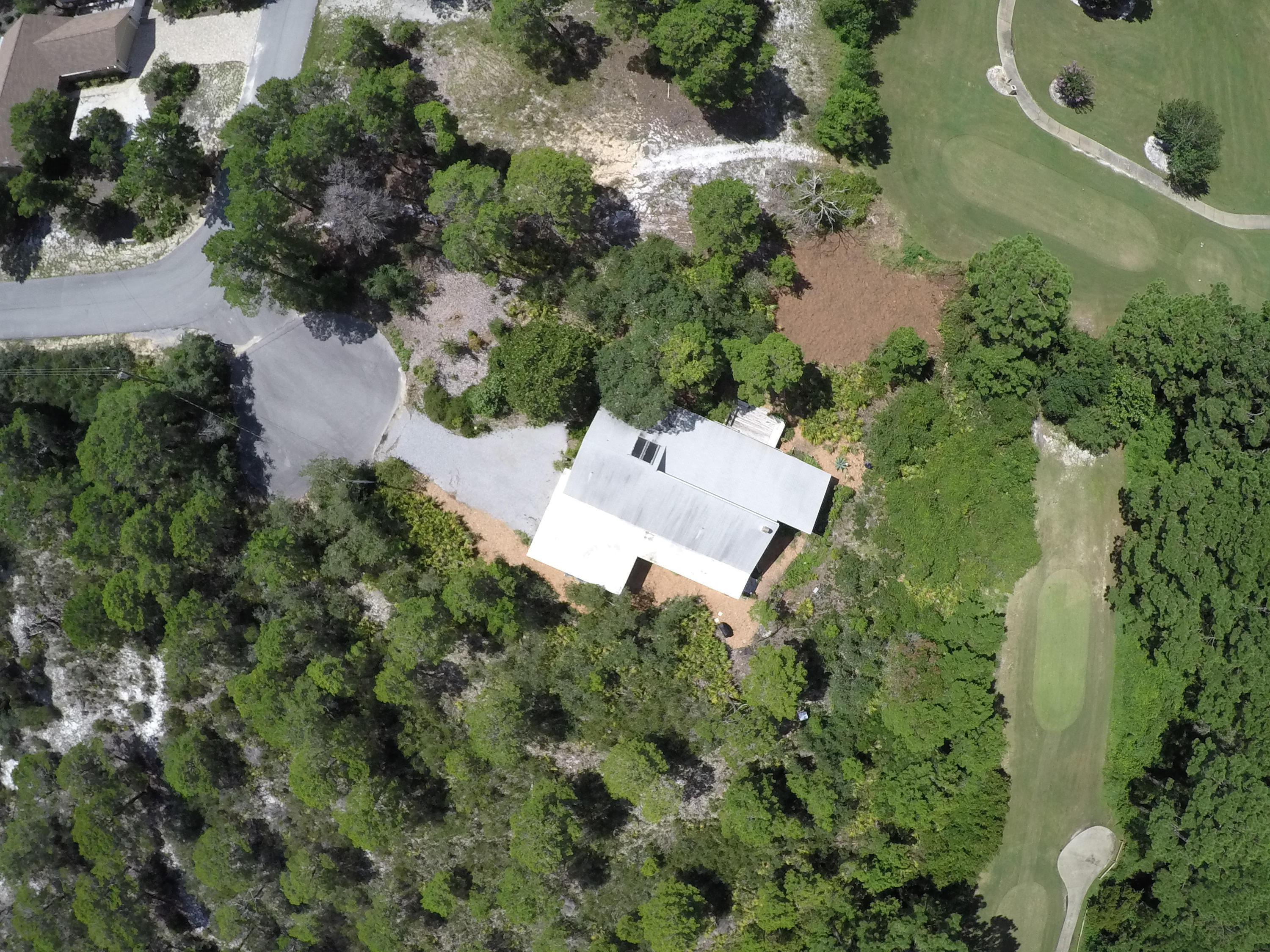 568 Ridge Road Santa Rosa Beach, FL 32459 - Photo 3 of 31 an aerial view of a house with yard and outdoor space