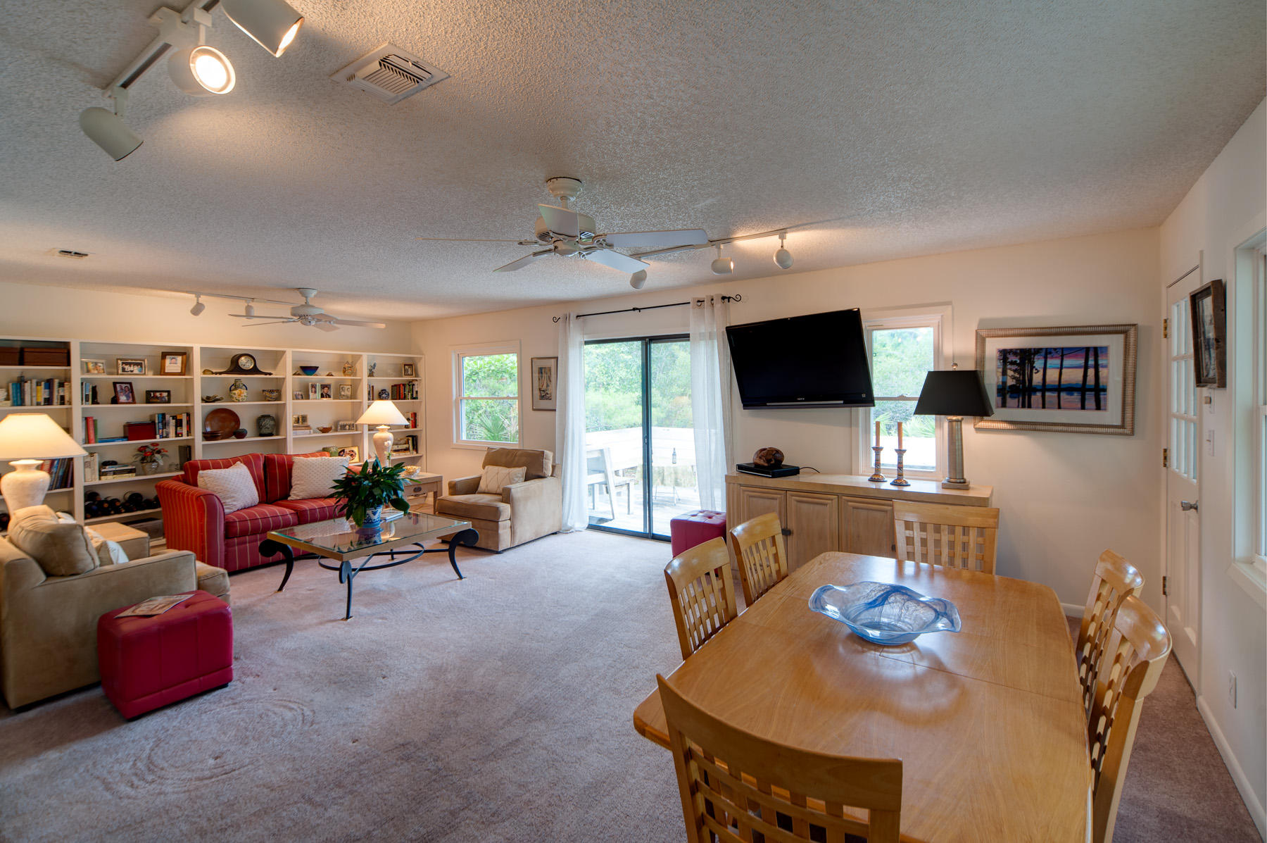 568 Ridge Road Santa Rosa Beach, FL 32459 - Photo 8 of 31 a living room with furniture and a flat screen tv