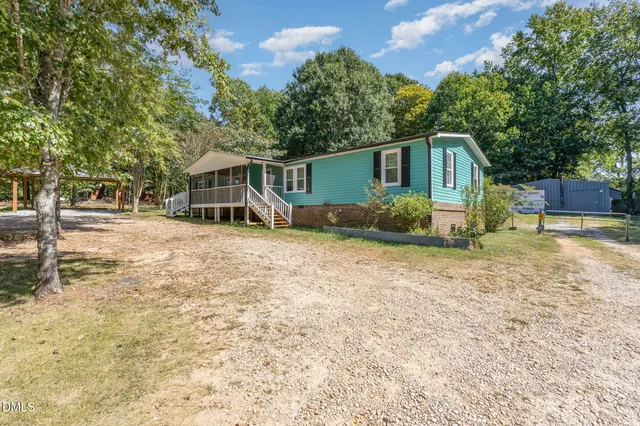 a house with trees in front of it