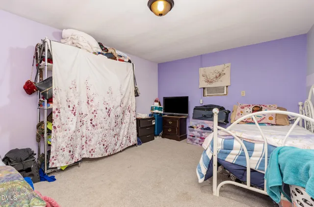 a bathroom with a sink vanity granite and a mirror