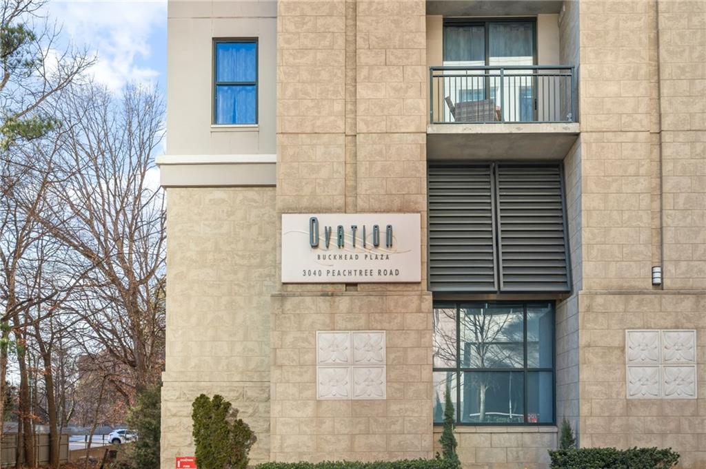 3040 Peachtree Road Northwest, Unit 605 Atlanta, GA 30305 - Photo 2 of 29 a view of a brick building