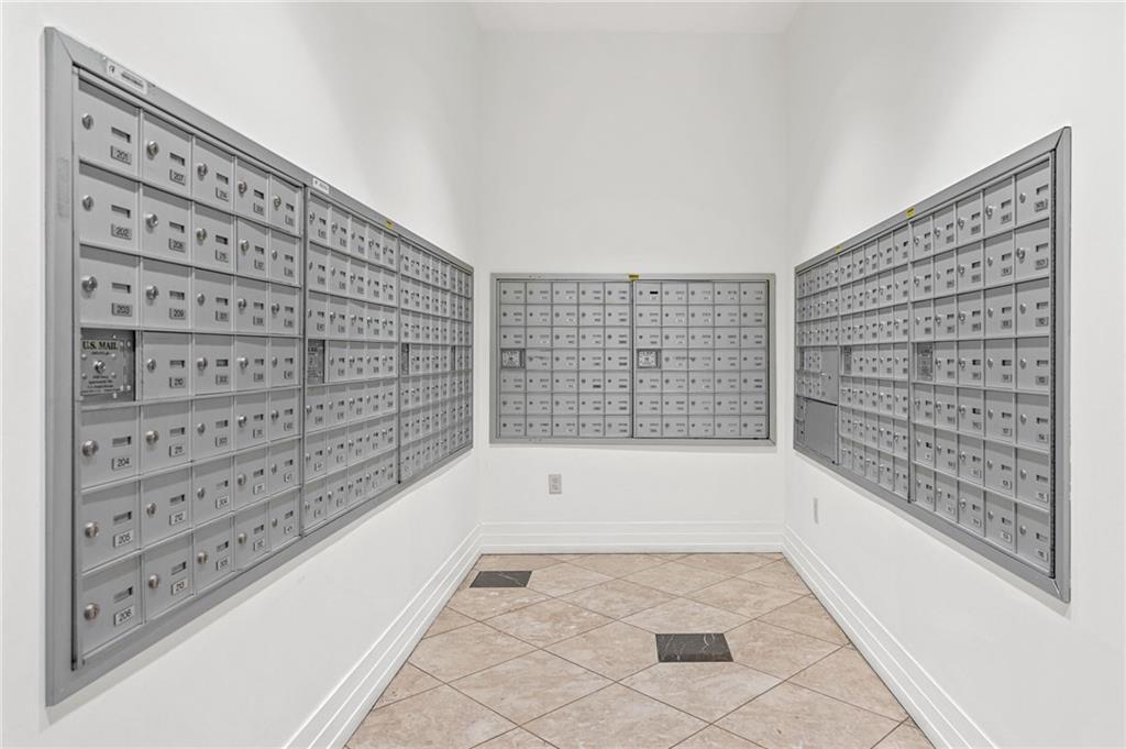 3040 Peachtree Road Northwest, Unit 605 Atlanta, GA 30305 - Photo 26 of 29 a view of walk in closet with empty racks