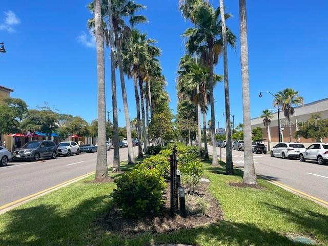 20080 Ragazza Circle, Unit 102 Venice, FL 34293 - Photo 49 of 49 a view of a street with a building and a park