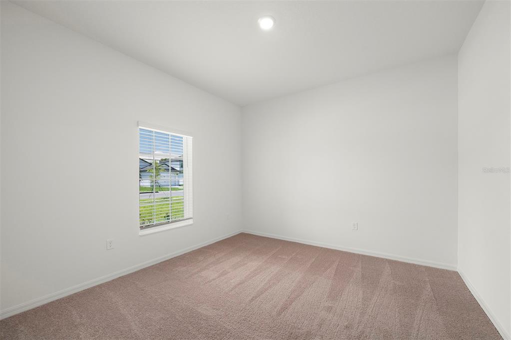 13288 Tula Loop Astatula, FL 34705 - Photo 15 of 23 an empty room with a window