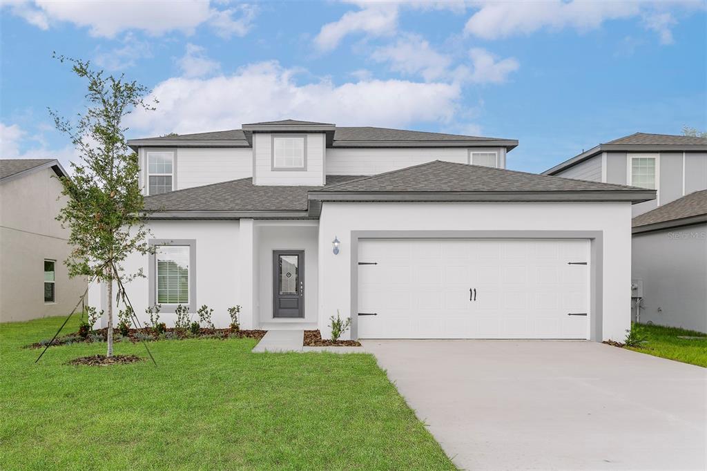 13288 Tula Loop Astatula, FL 34705 - Photo 2 of 23 a view of a house with a outdoor space