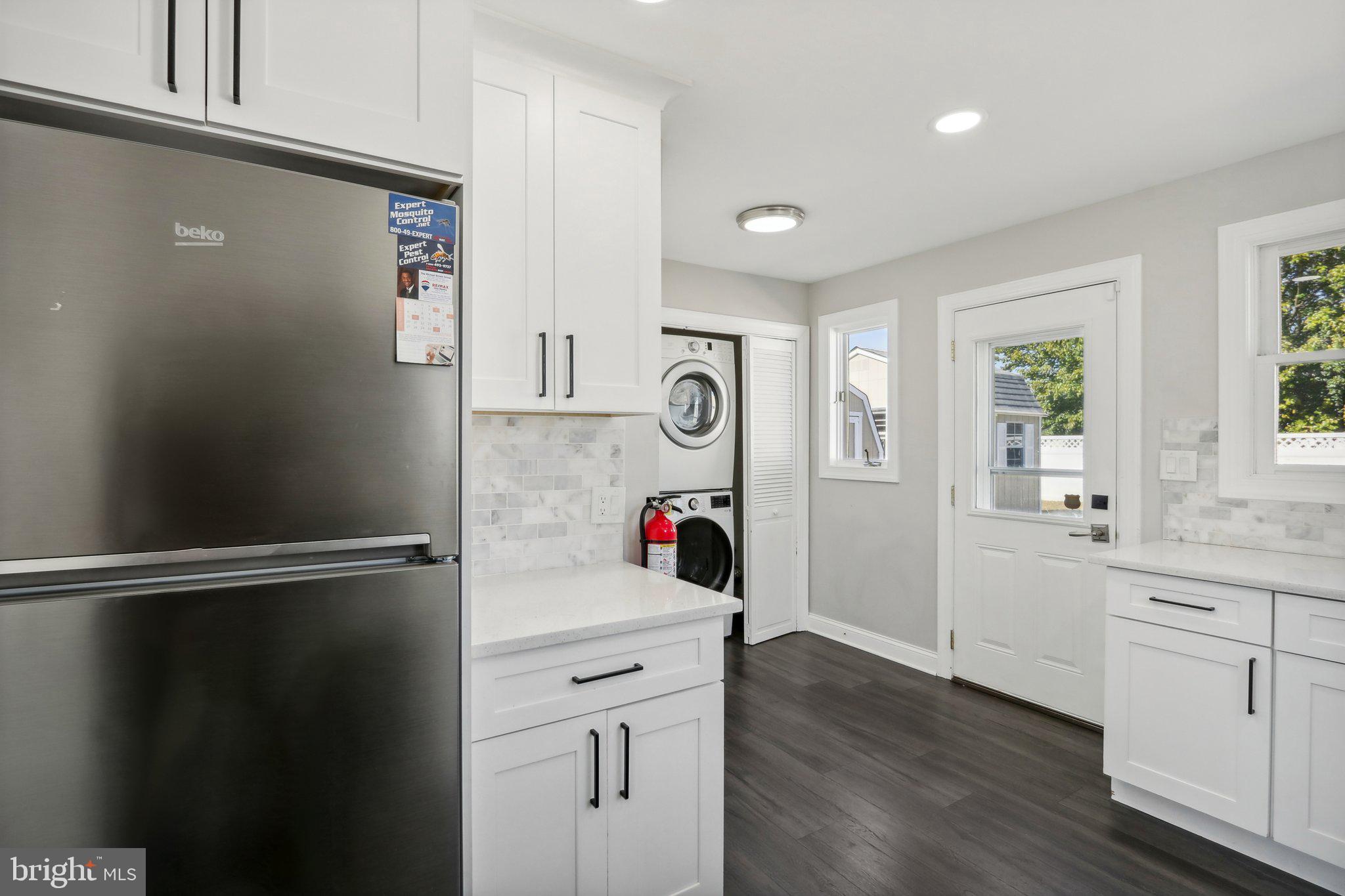 935 Mt Road Burlington, NJ 08016 - Photo 13 of 36 a view of cabinets and wooden floor