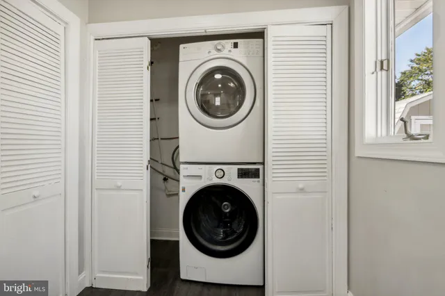 a utility room with dryer and washer