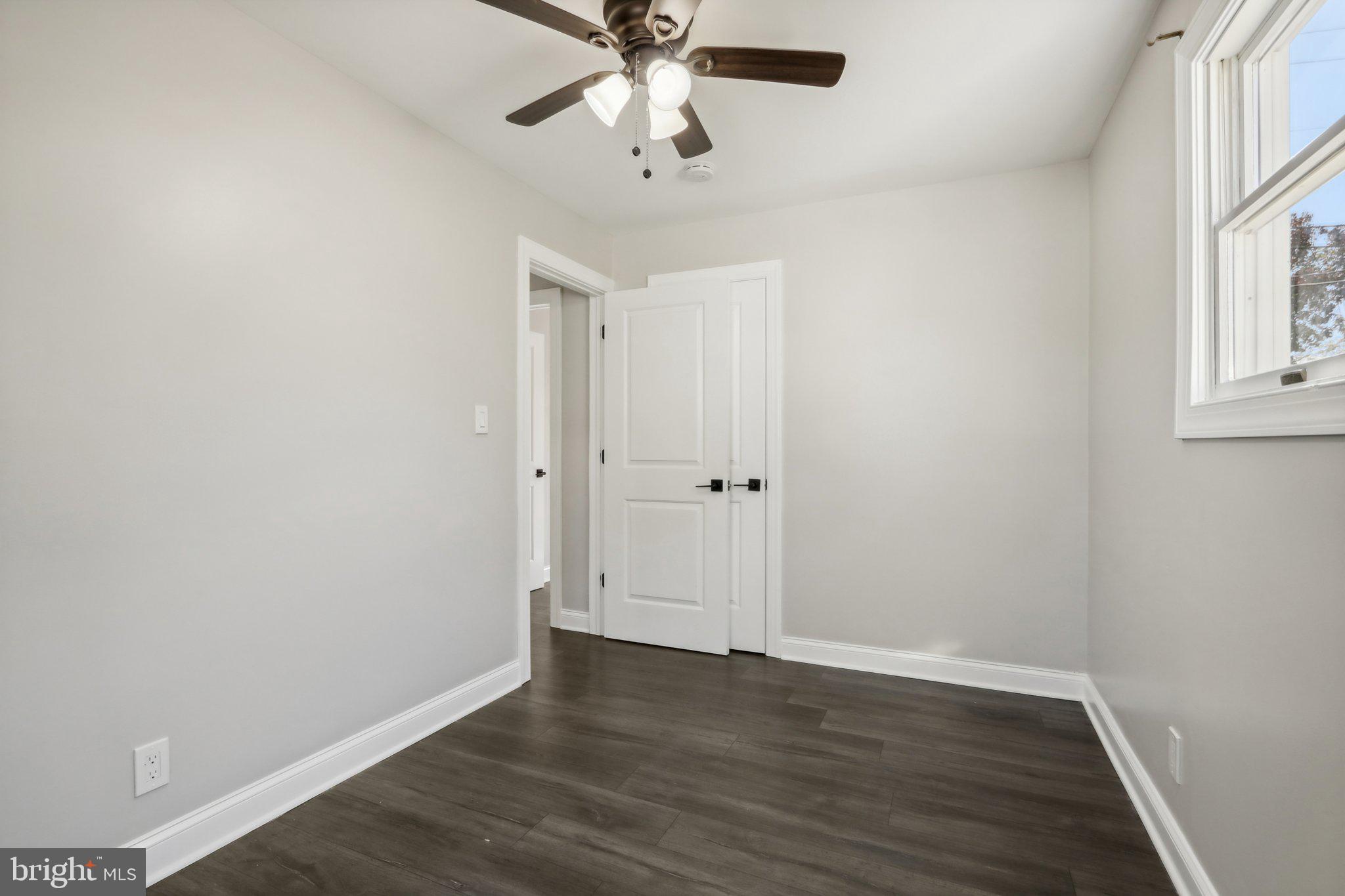935 Mt Road Burlington, NJ 08016 - Photo 25 of 36 wooden floor in an empty room with a window