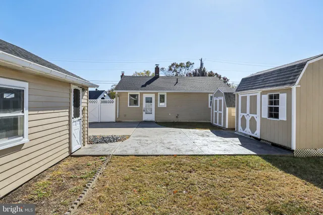 a front view of a house with yard