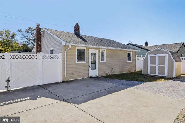 a front view of a house with a garage