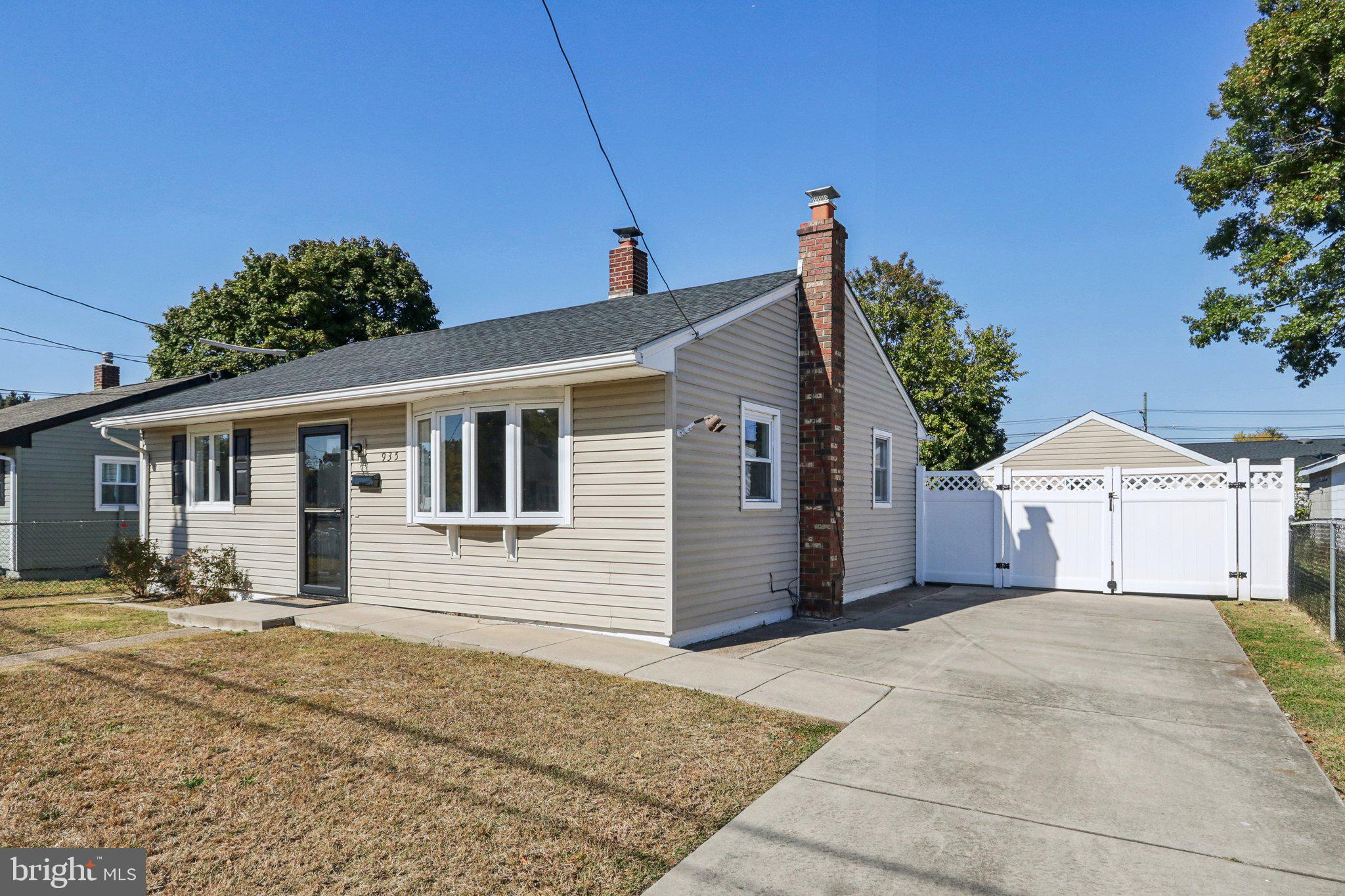 935 Mt Road Burlington, NJ 08016 - Photo 4 of 36 a front view of a house with a yard