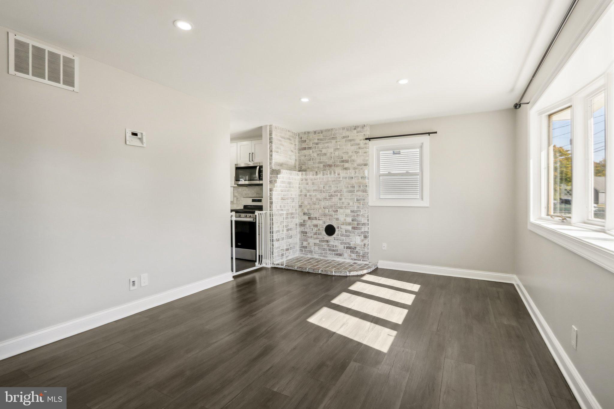 935 Mt Road Burlington, NJ 08016 - Photo 8 of 36 wooden floor in an empty room with a window