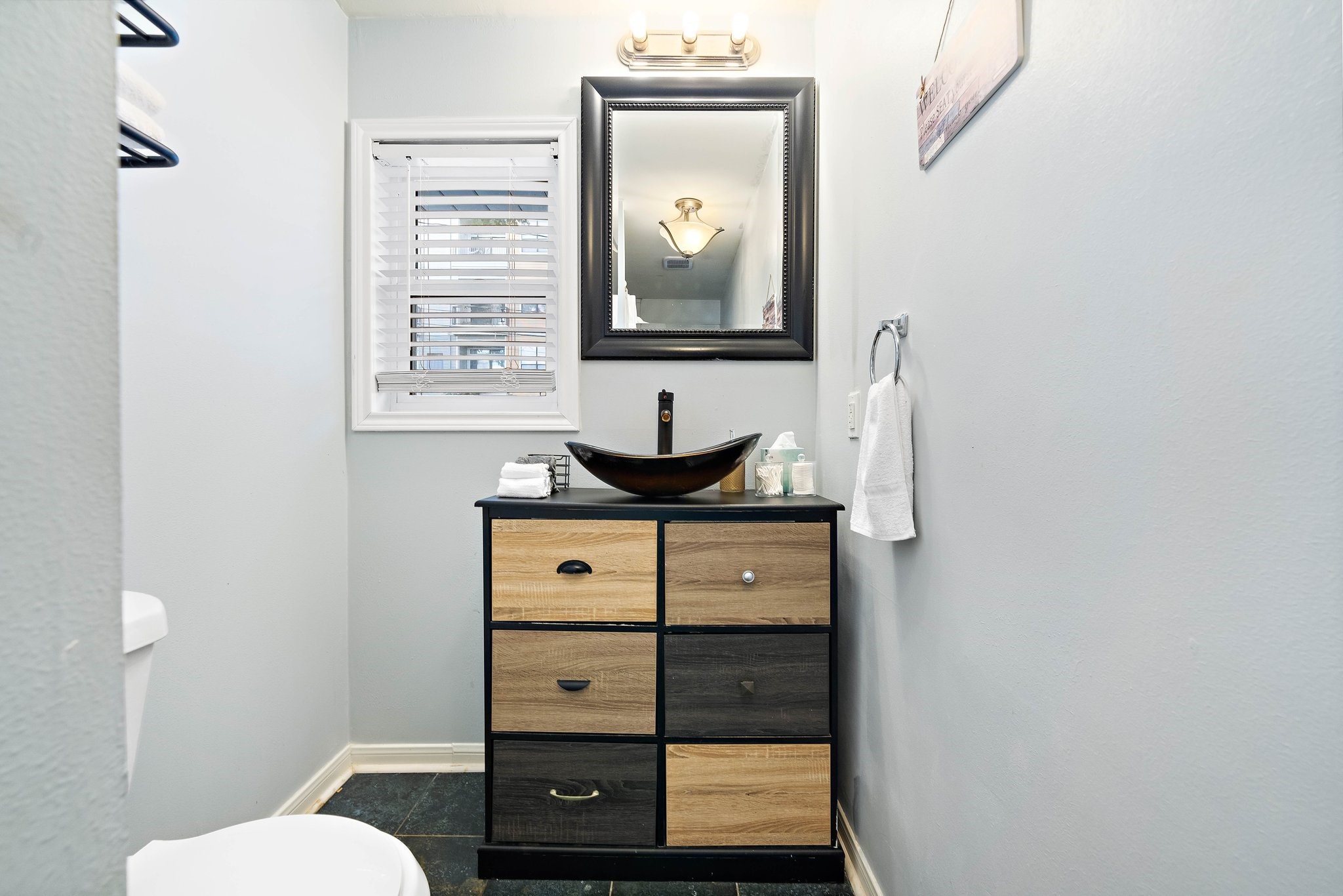 1825 Locksford Street Houston, TX 77008 - Photo 29 of 30 a bathroom with a toilet and a sink