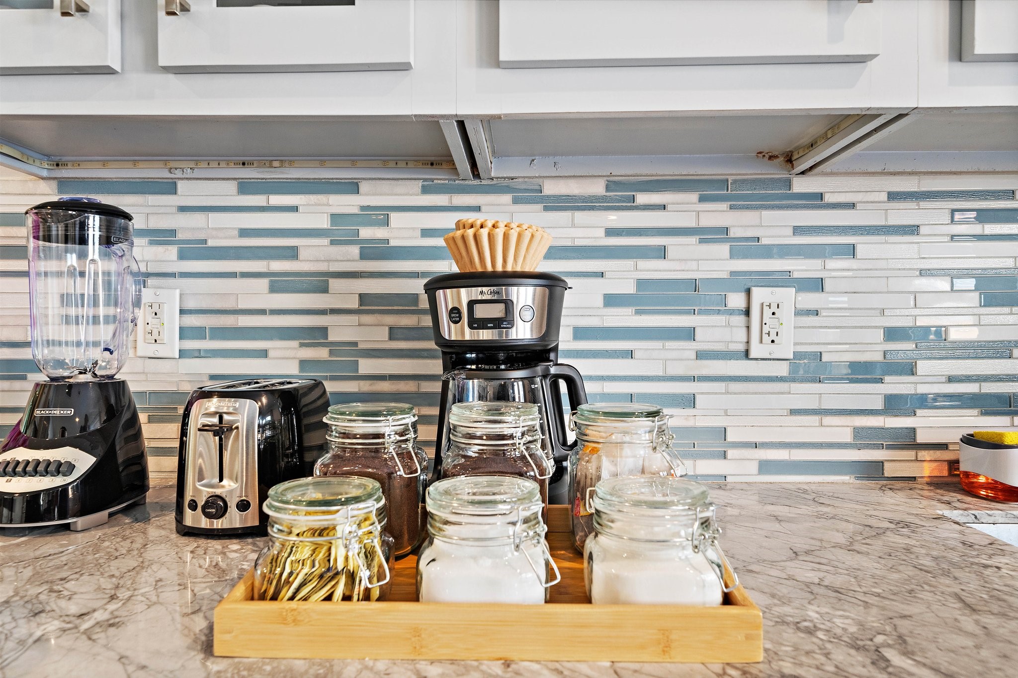 1825 Locksford Street Houston, TX 77008 - Photo 7 of 30 a table with wine bottles and glasses on it