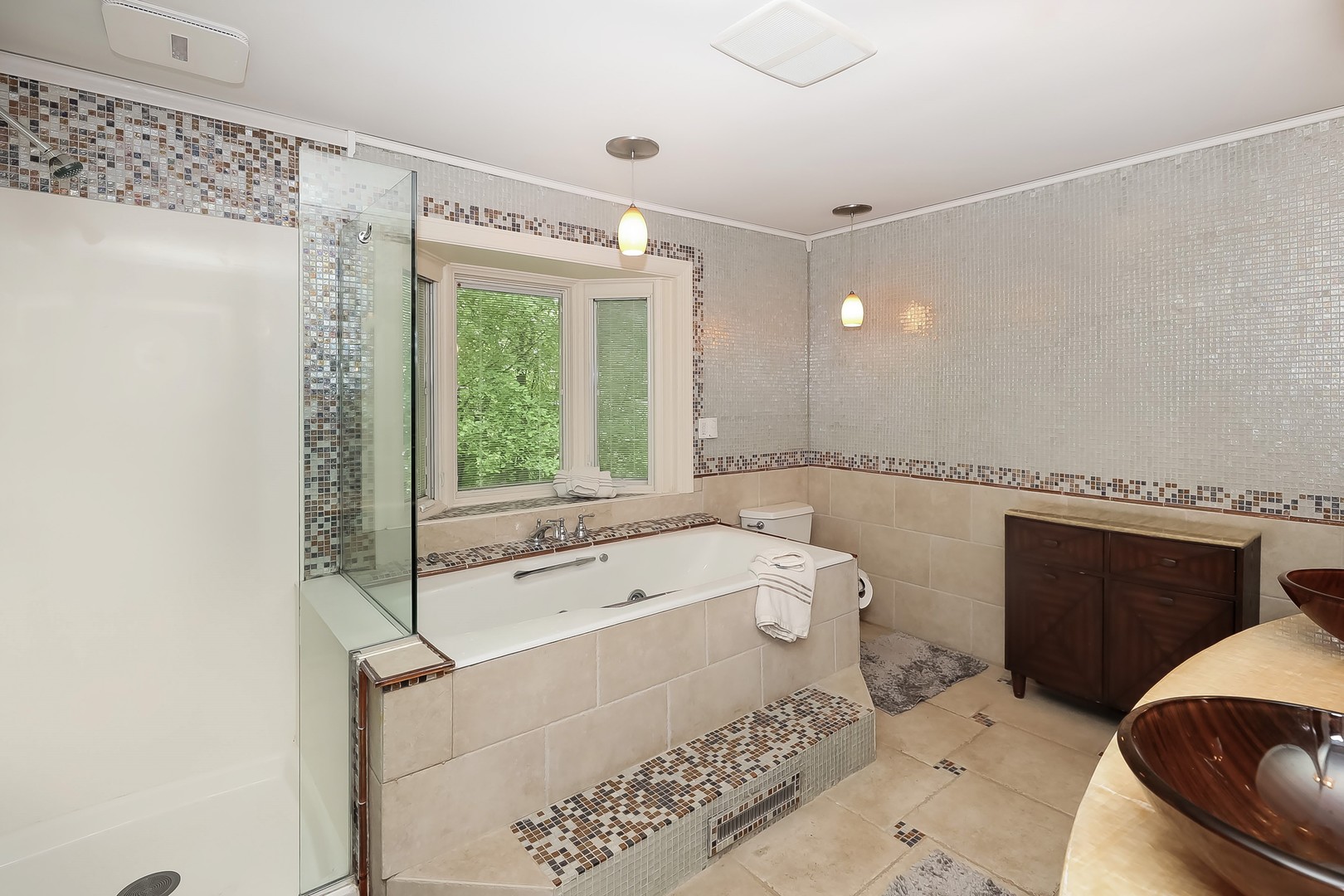 7704 Newbold Road Cary, IL 60013 - Photo 25 of 56 a bathroom with a sink a toilet and a shower