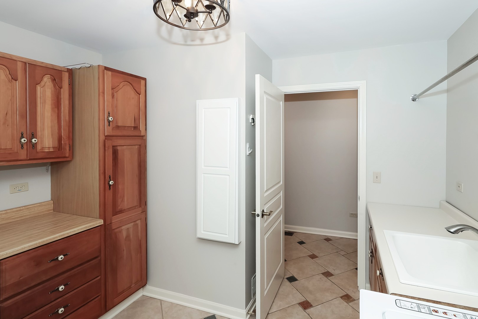 7704 Newbold Road Cary, IL 60013 - Photo 29 of 56 a bathroom with a sink a toilet and shower