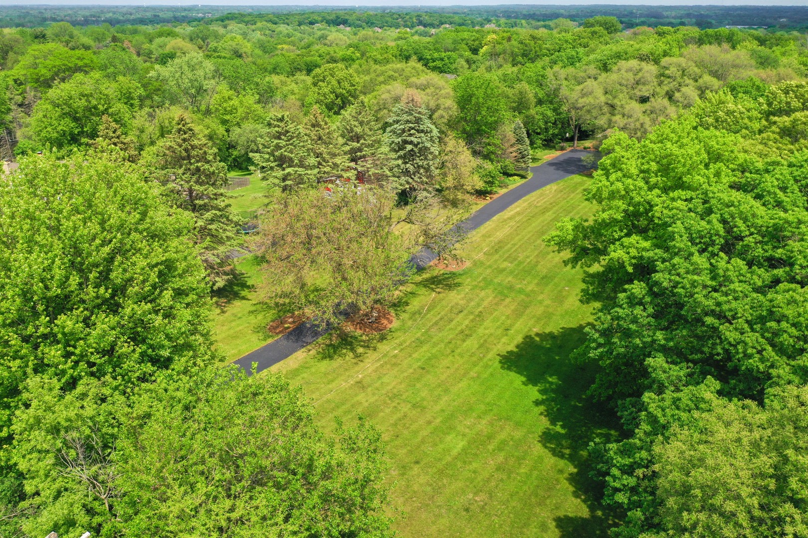 7704 Newbold Road Cary, IL 60013 - Photo 50 of 56 a view of a yard with plants